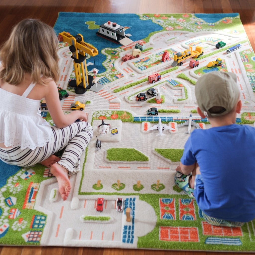 Two Kids playing on Mini City XL