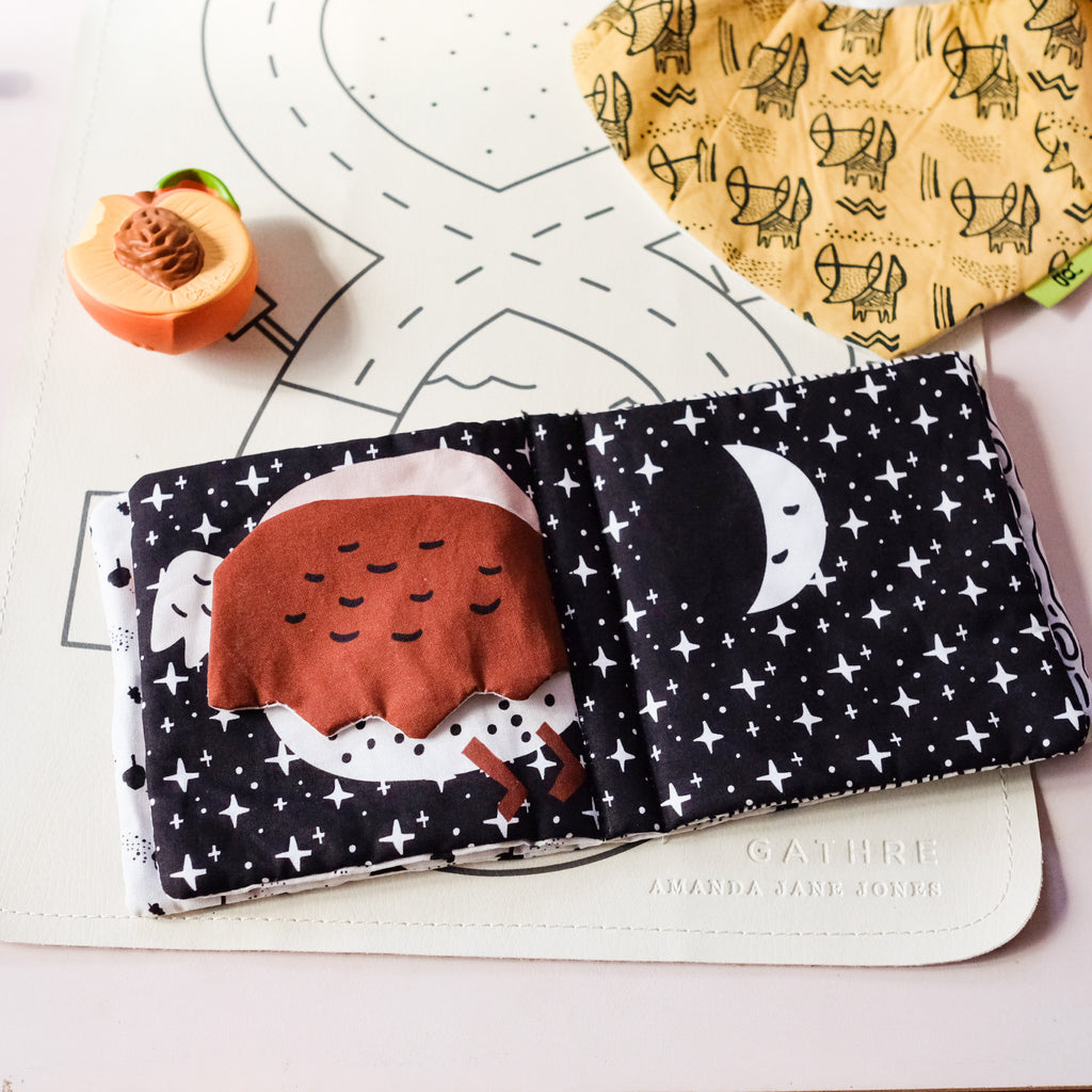 Wee Gallery Peekaboo Forest Crinkle Book owl covering face